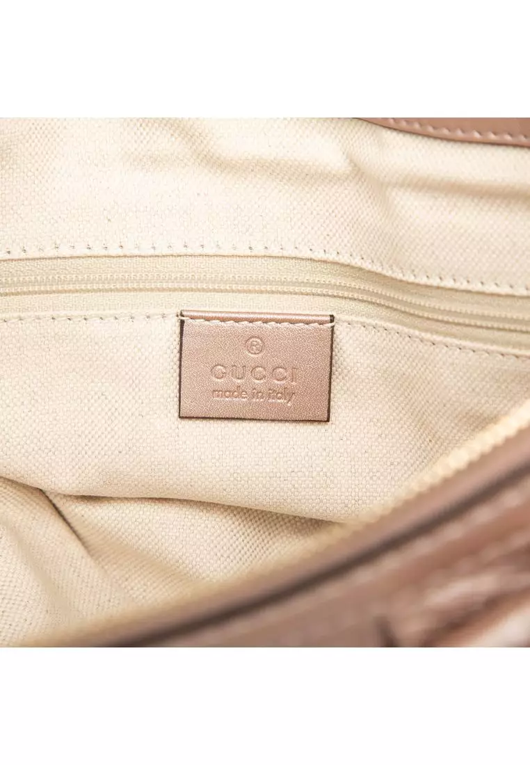 Pre-Loved Gucci Metallic Microguccissima Sukey Satchel