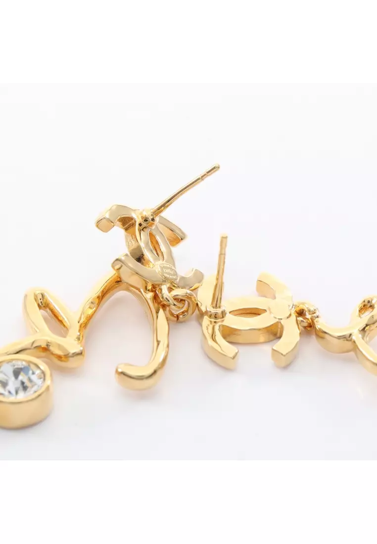 Pre-Loved Chanel coco mark logo earrings GP Rhinestone gold clear I24S