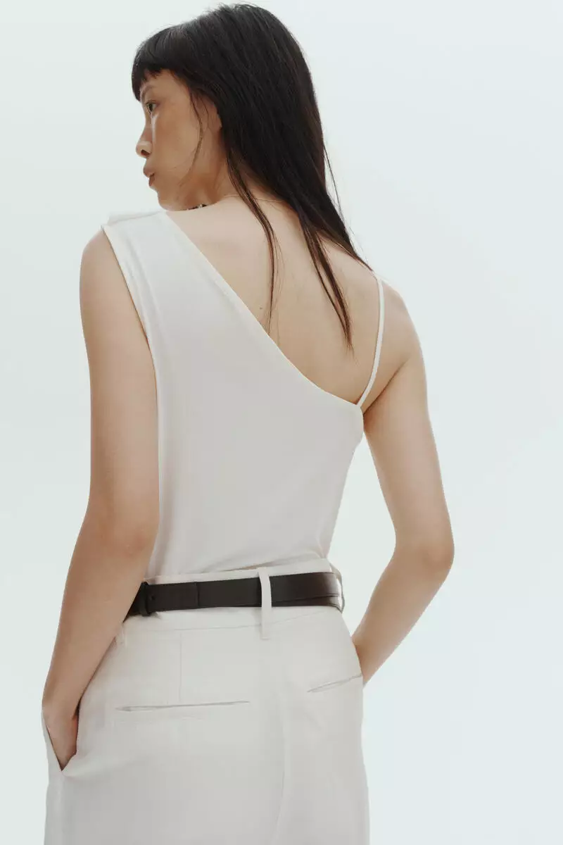 Draped asymmetric top