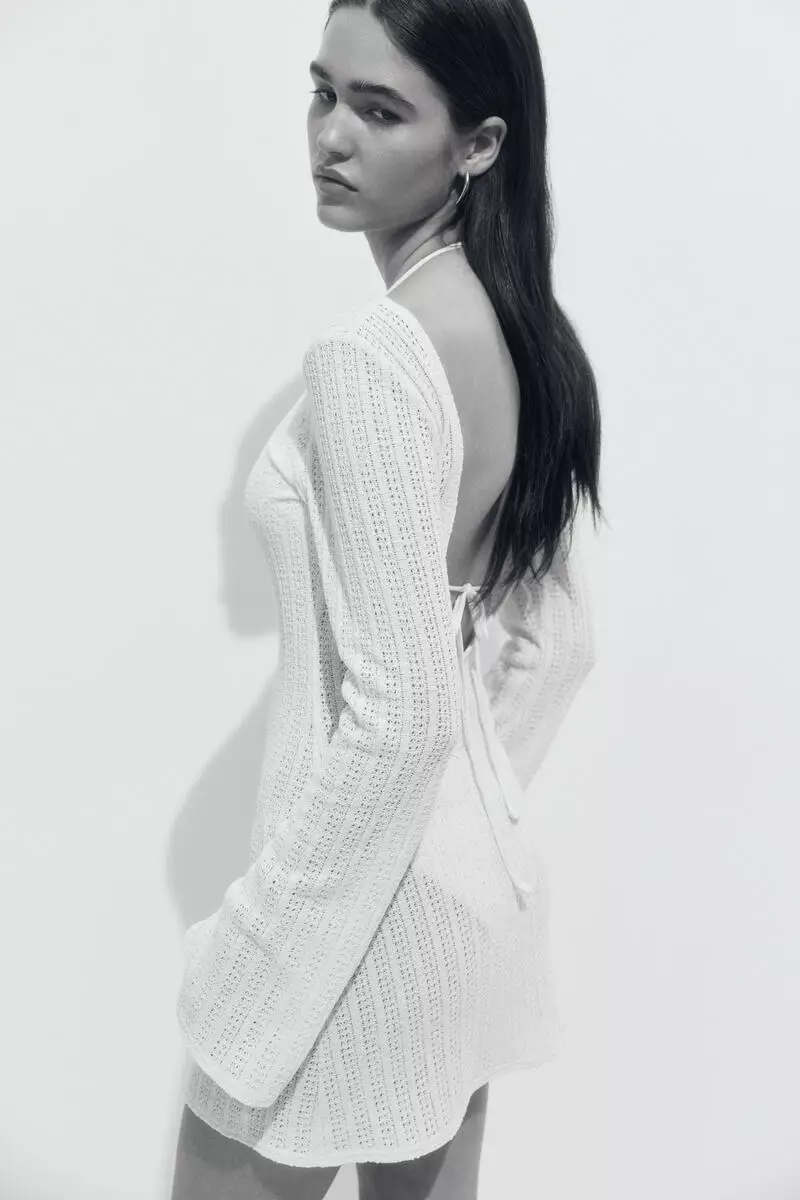 h&m white beach dress Effortless Charm: The Solid Knit Cut Out Mini Beach Dress  LUNARITY GARAGE