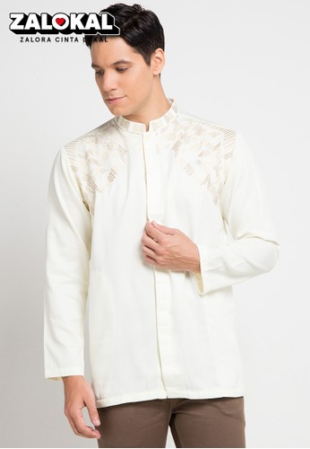 warna putih juga bersifat timeless, sehingga bisa dikenakan kapan saja, termasuk saat perayaan Hari Raya.