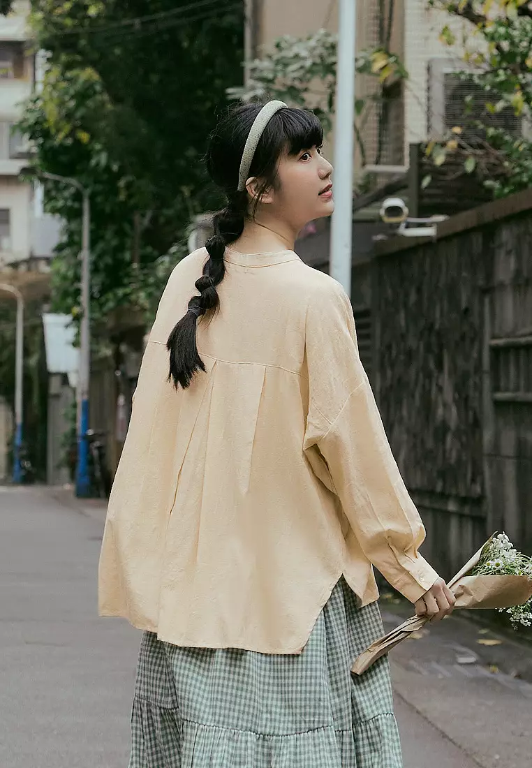 立體織紋中山領前短後長貝殼排扣寬鬆襯衫《AB19254》