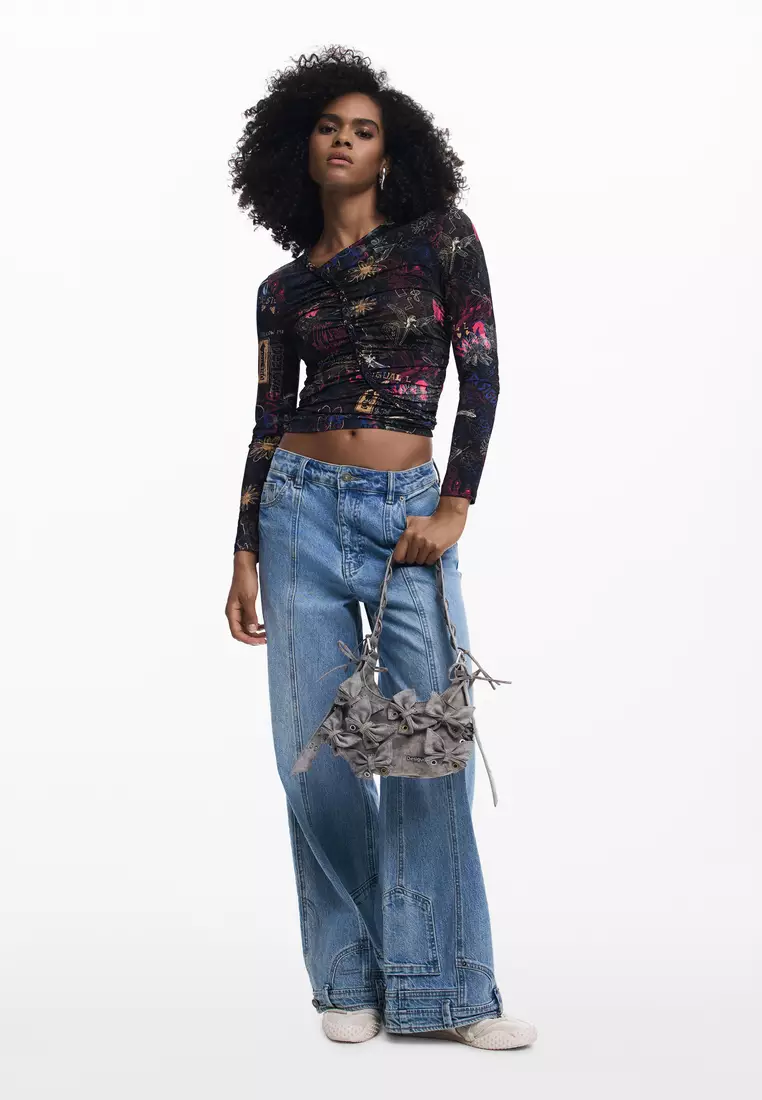 Handbag with small butterfly decoration