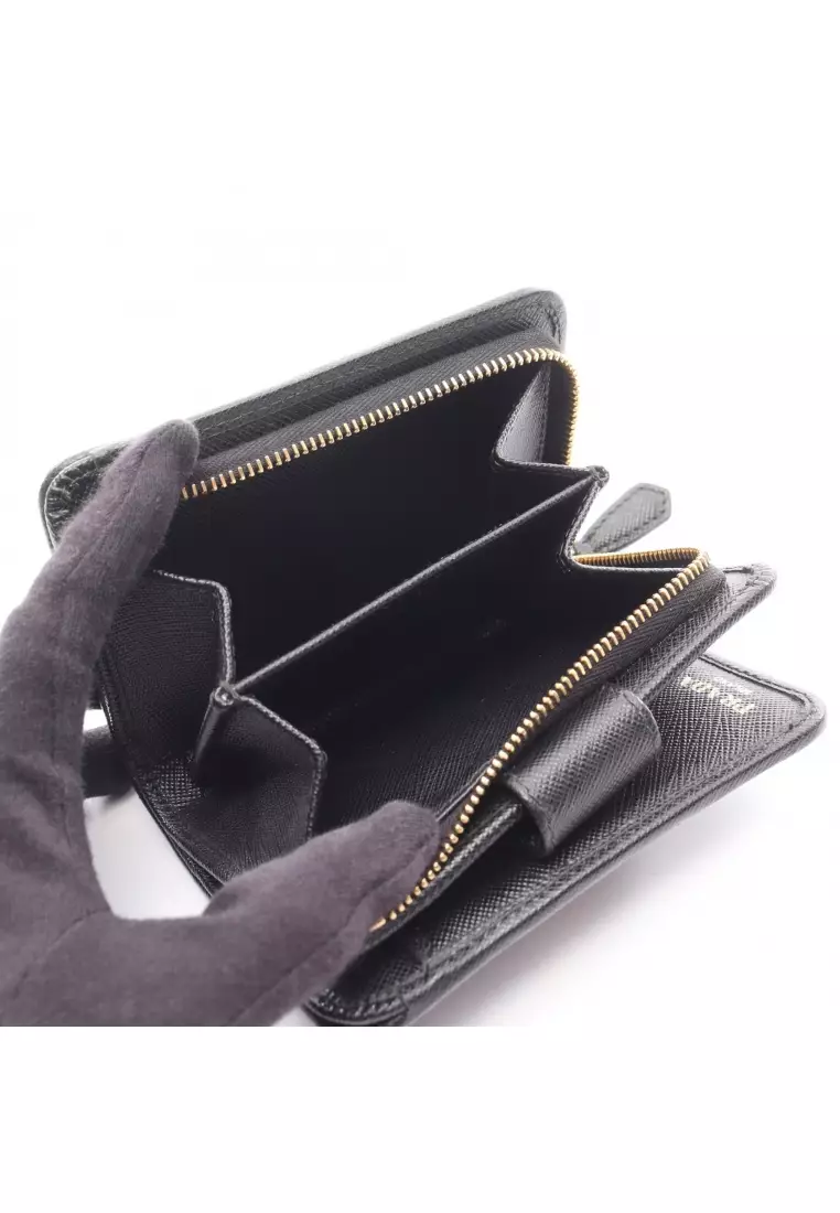 Pre-Loved Prada PORTAF PICCOLO LAMPO Bi-fold wallet nylon canvas leather black