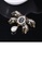 Glamorousky black Elegant Vintage Plated Gold Ribbon Imitation Pearl Brooch with Black Cubic Zirconia 34DA9ACE26A3F2GS_3