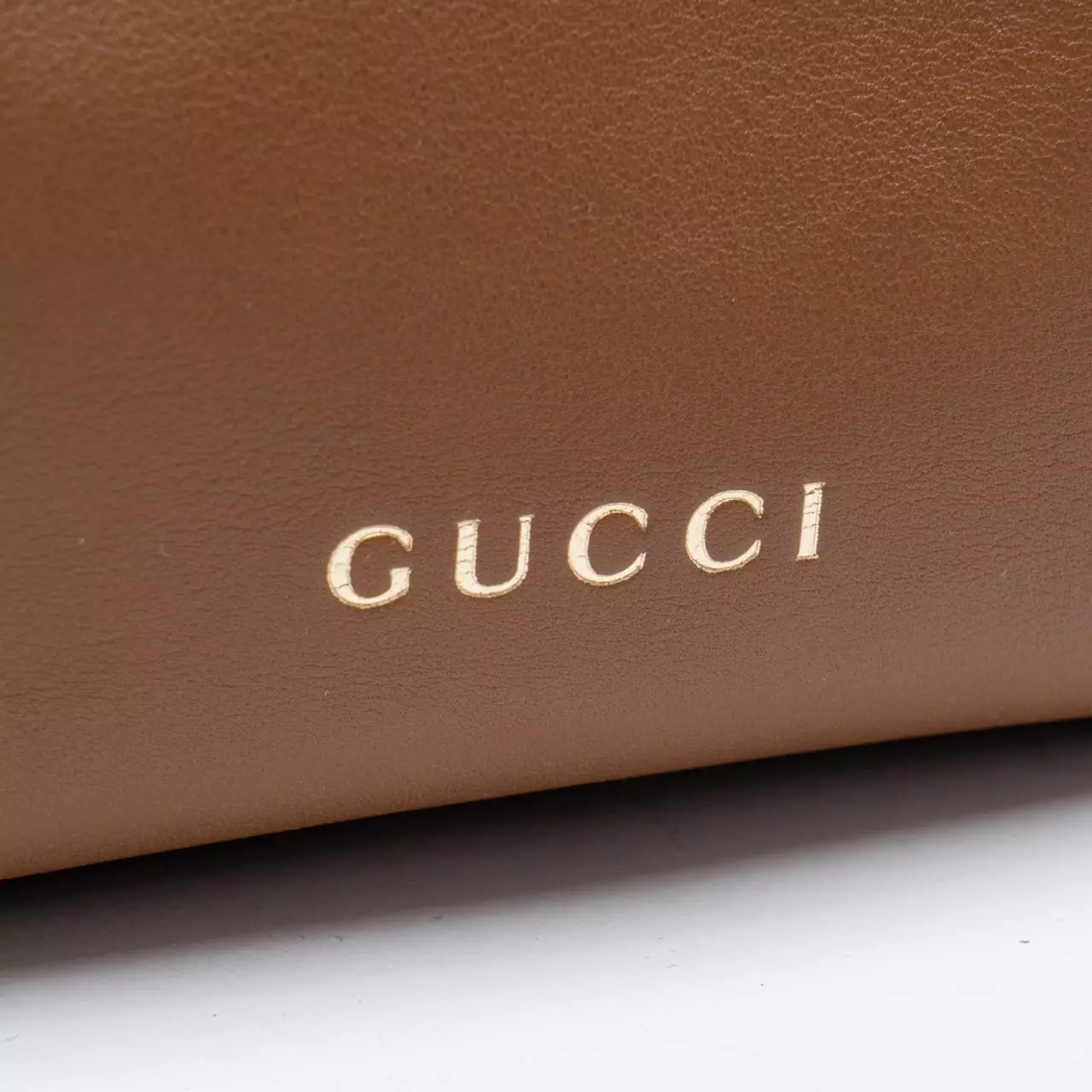 GG Emblem Small Smooth Leather Bucket Bag Brown