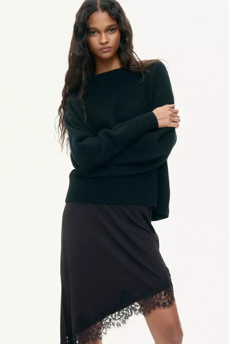 Asymmetric lace-trimmed skirt