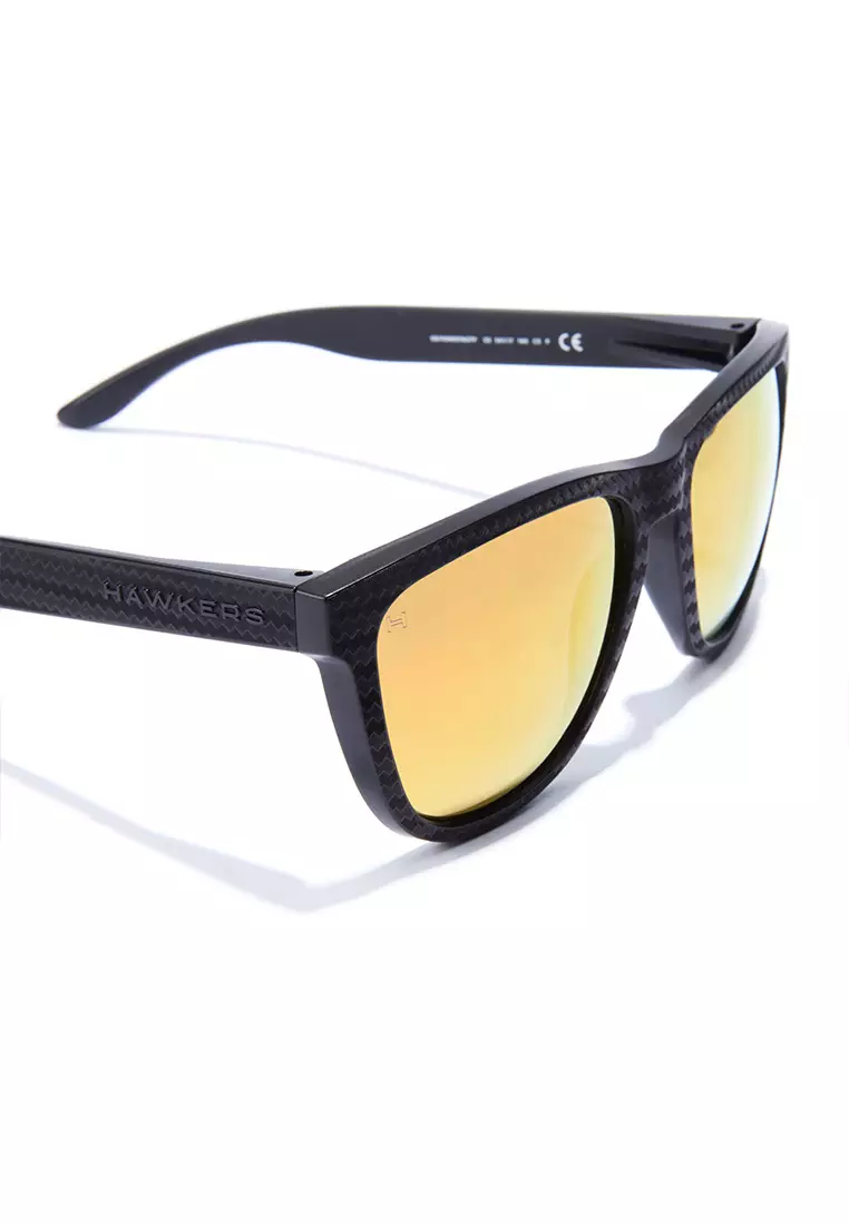 HAWKERS POLARIZED Daylight ONE CARBONO RAW. Sunglasses for Men and Women, Unisex. UV400 protection. Official product designed and made in Spain. HONR21NOTP