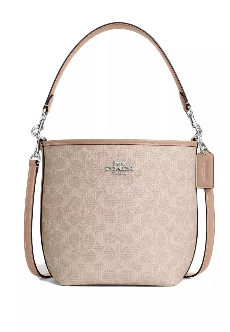 Buy Coach City Bucket Bag In Signature Canvas Sand Beige 2025
