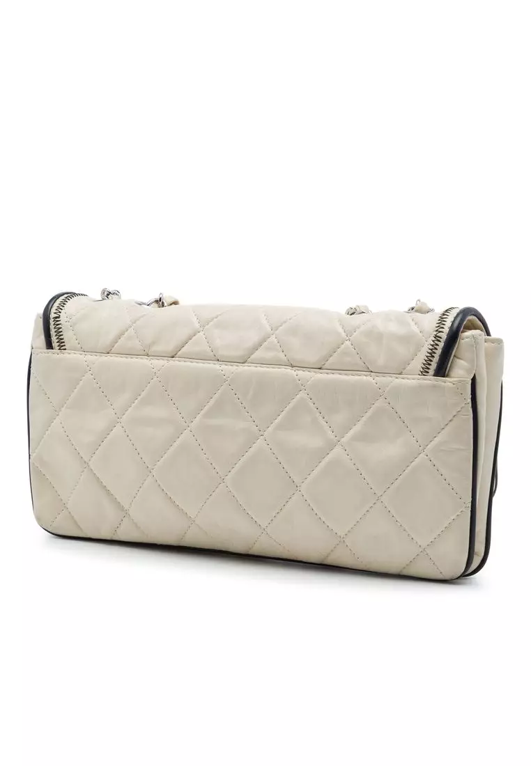 Pre-Loved Chanel Quilted Aged Lambskin Reissue 2.55 East West Flap