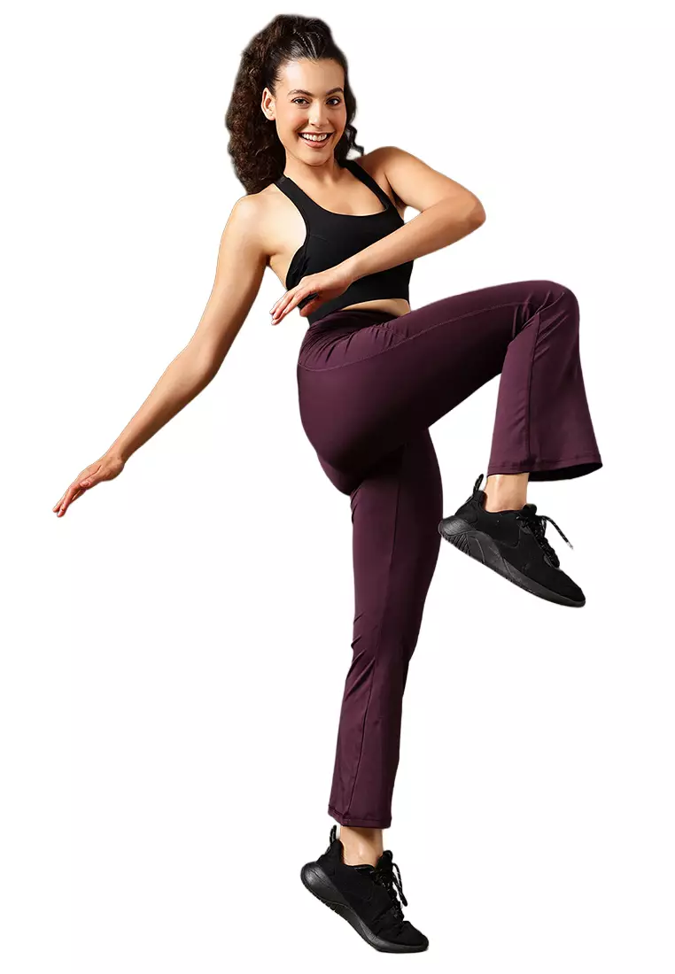 Clovia High Waist Flared Yoga Pants in Plum Colour with Side Pockets