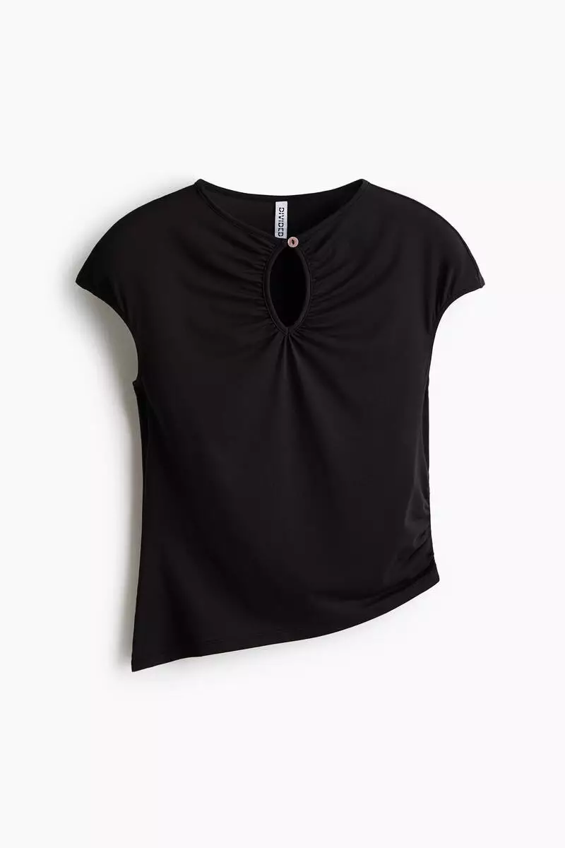 Asymmetric keyhole top