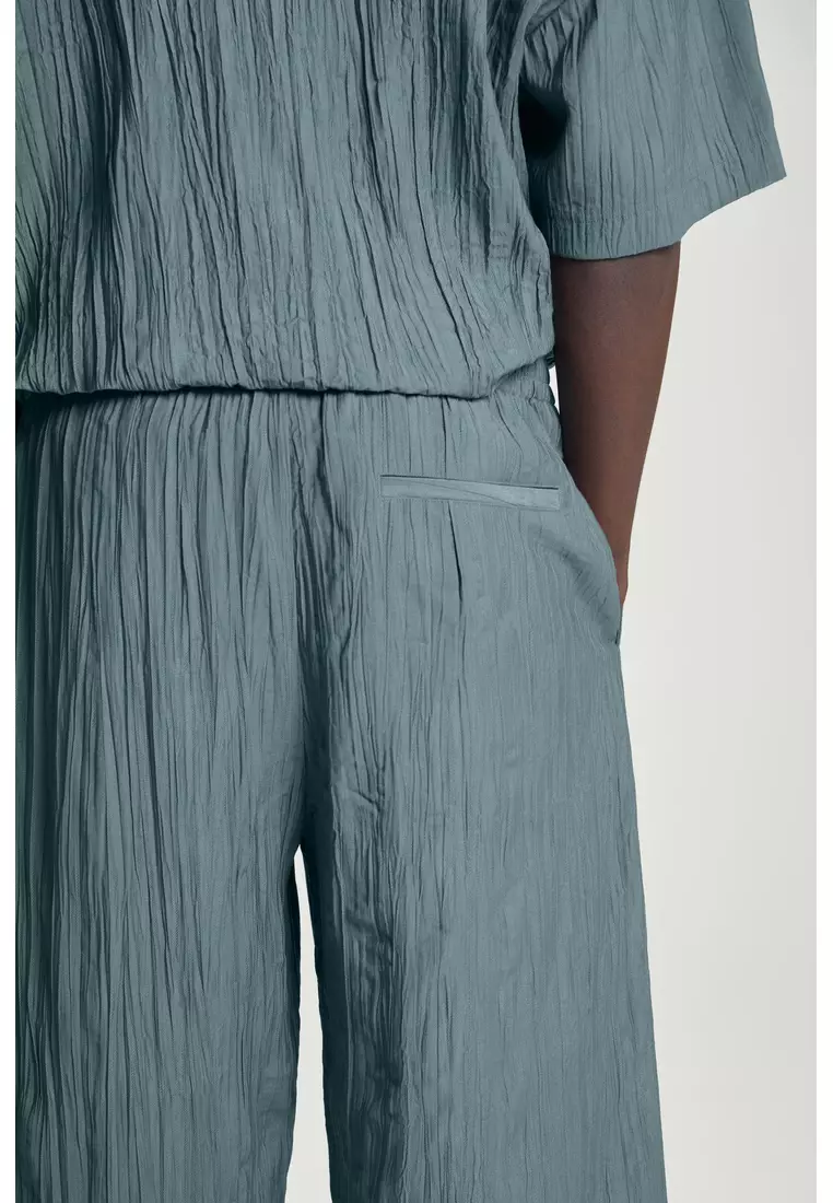 CRINKLED WIDE-LEG TROUSERS