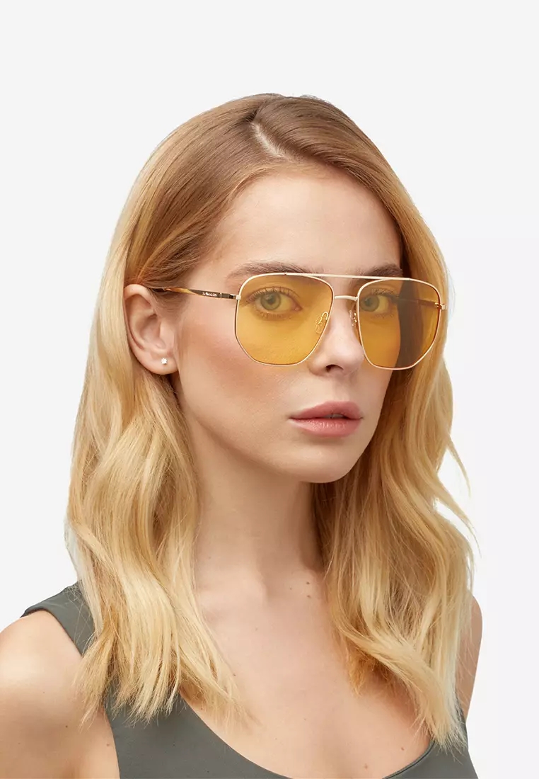 HAWKERS Gold Yellow CAD Sunglasses for Men and Women, Unisex. UV400 Protection. Official Product designed in Spain