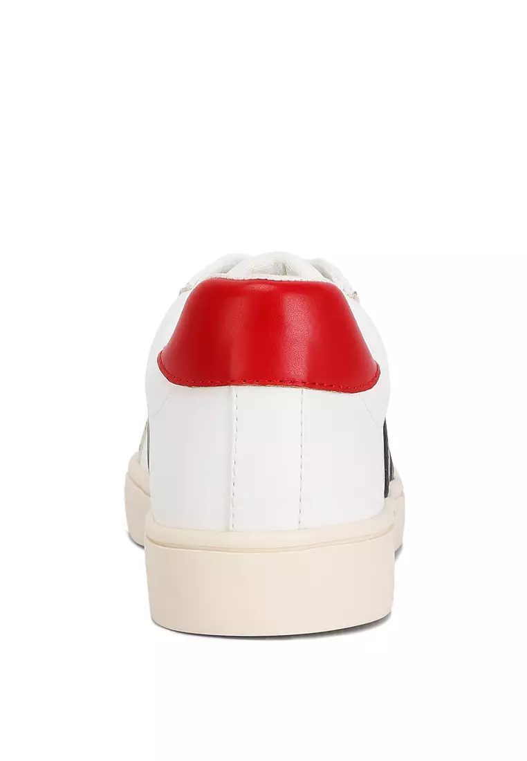 White sneakers with red back on sale