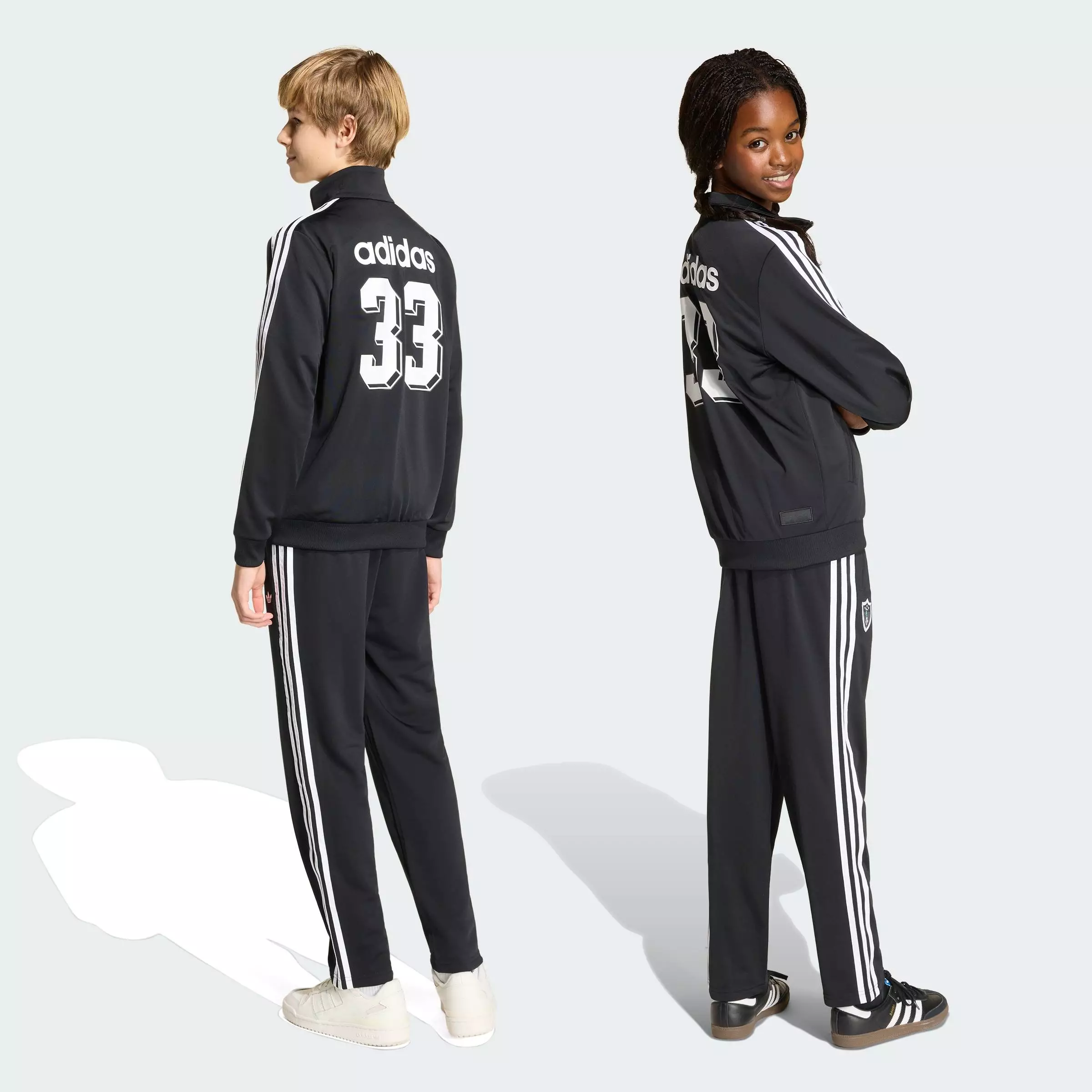 Lifestyle DISNEY FIREBIRD TRACKPANTS Unisex Black KC8441