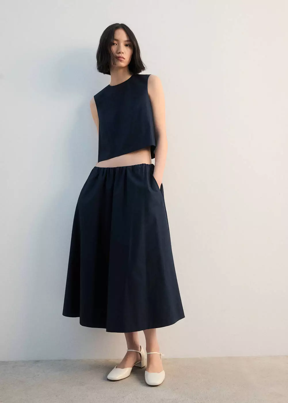 Rok midi katun berlipit