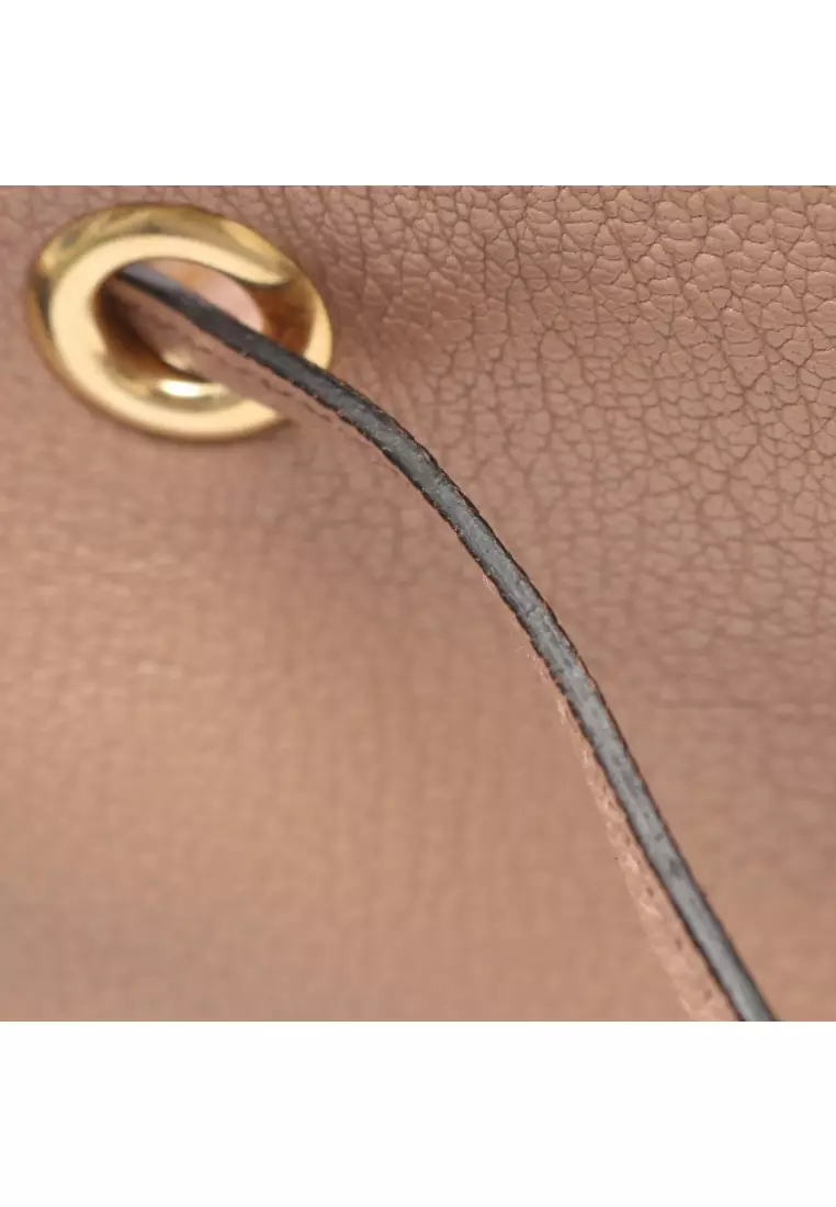 Pre-Loved MIU MIU Handbag leather pink beige 2WAY drawstring
