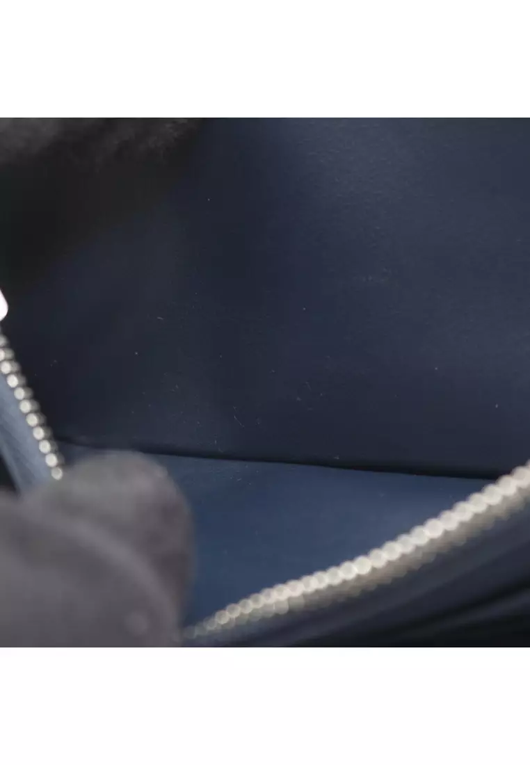 Pre-Loved Louis Vuitton zippy wallet Vertical round zipper long wallet taurillon leather Dark navy