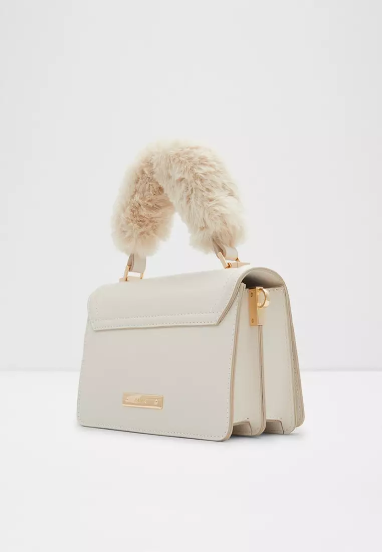 ALDO Notabena faux fur top handle bag with crossbody strap in bone