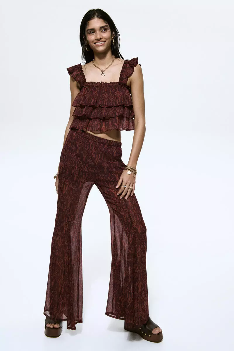 Flared crinkled trousers