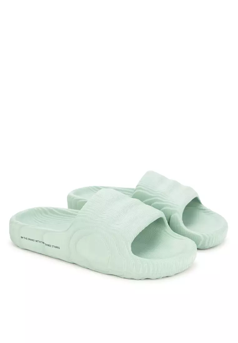 Green adidas sliders deals