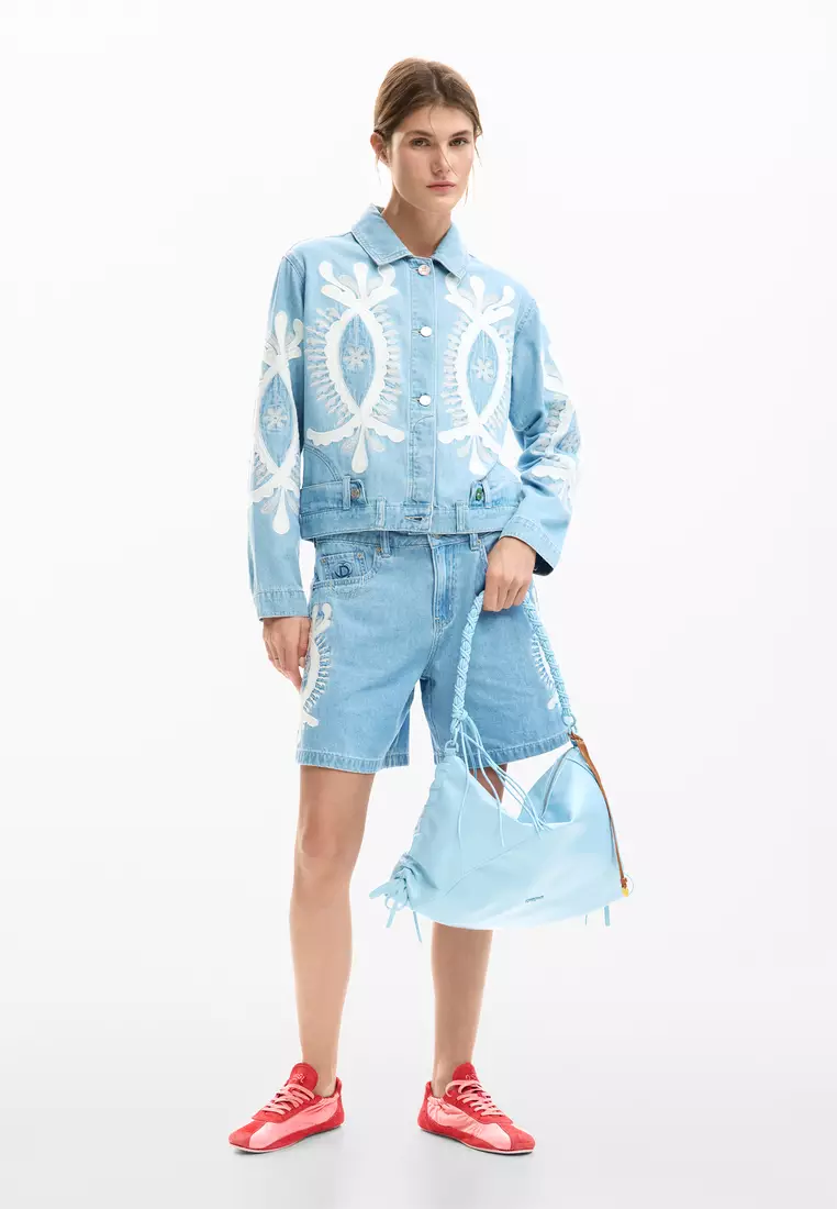 Reversible jacket with embroidery