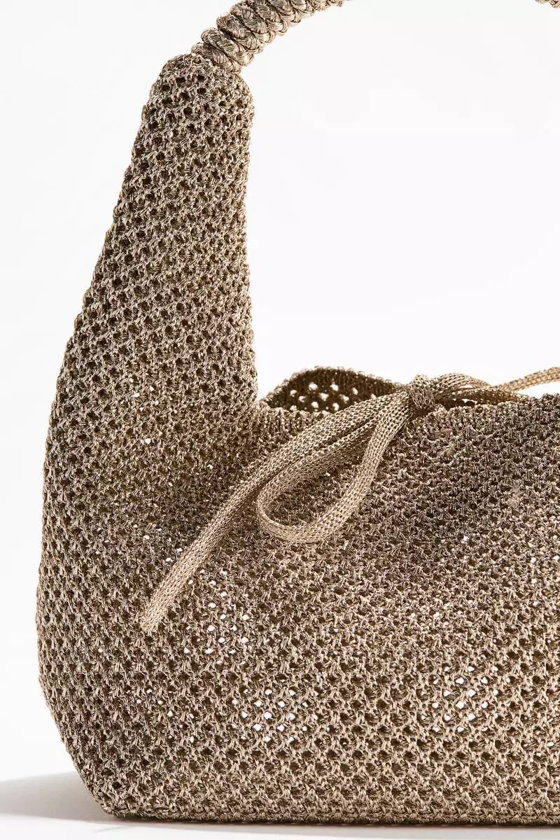 Glittery hole-knit handbag