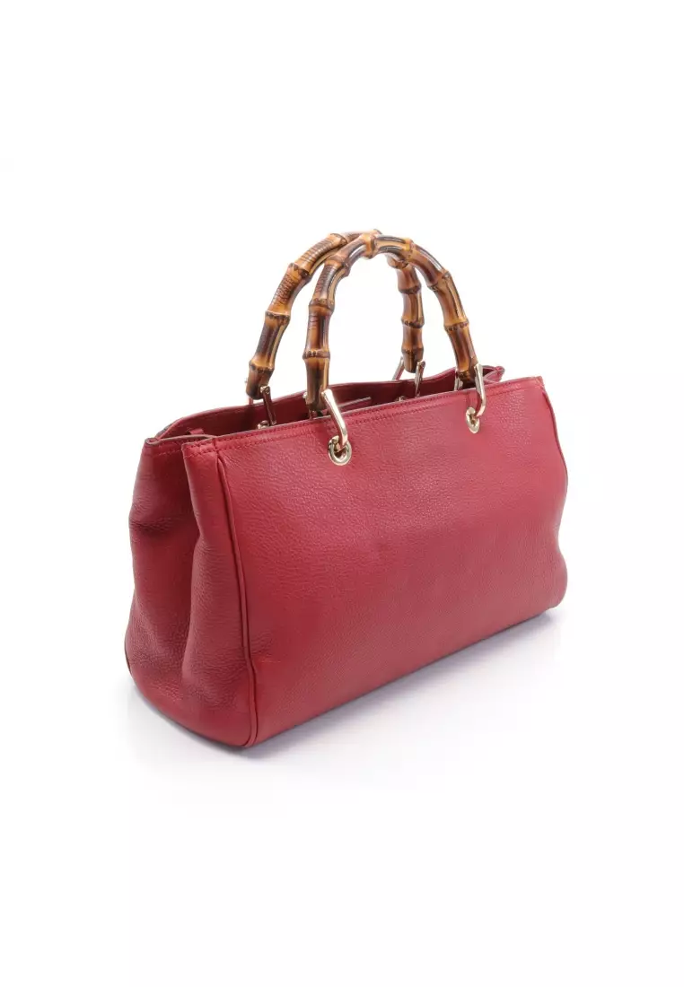 Gucci red bamboo hotsell bag