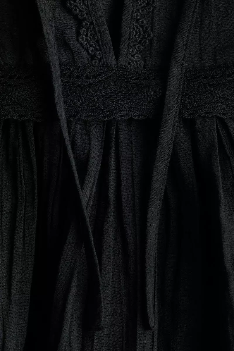 Lace-trimmed cotton blouse