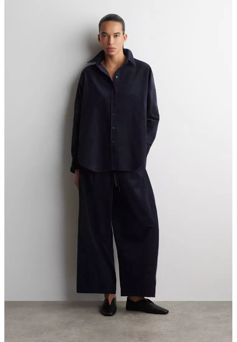 ELASTICATED CORDUROY BARREL-LEG TROUSERS
