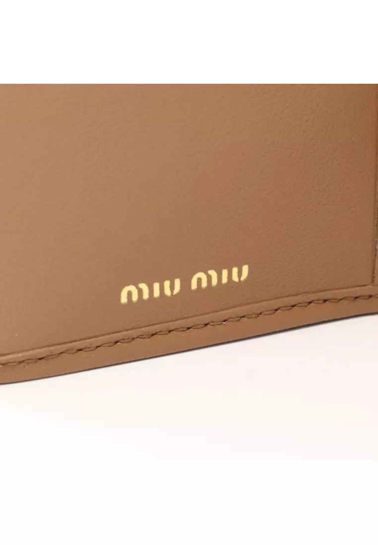 Pre-Loved MIU MIU matelasse Bi-fold Long Wallet leather light brown