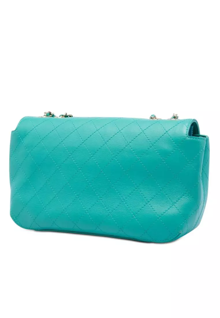 Pre-Loved Chanel Medium Stitched Calfskin Covered Cc Flap