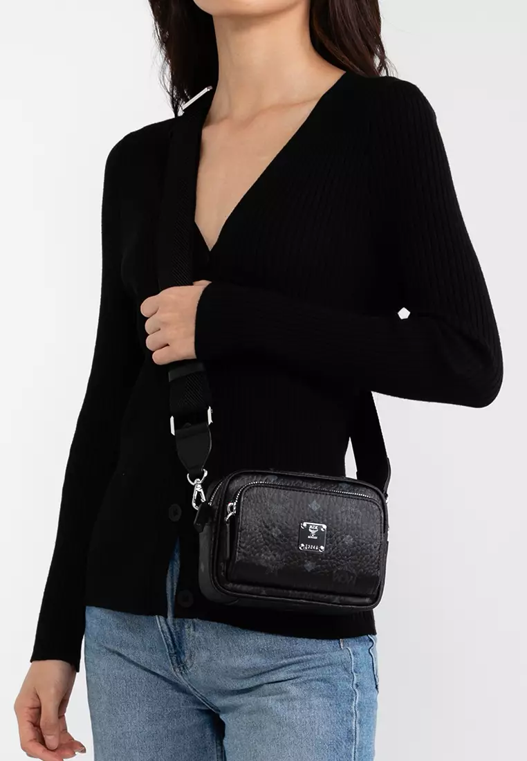 Mcm mini deals crossbody backpack