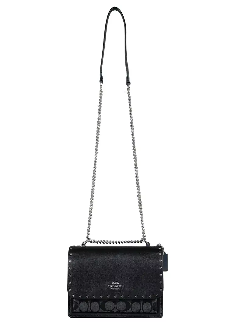 Klare Crossbody In Signature Canvas With Rivets Graphite Black