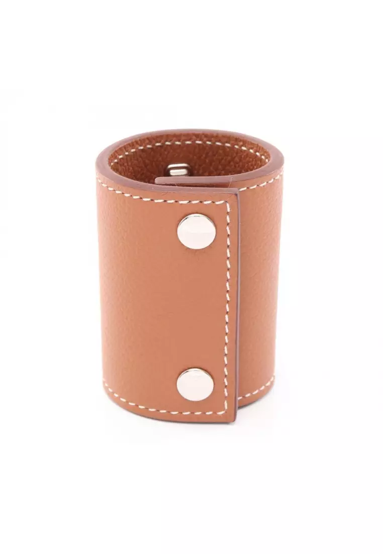 Pre-Loved Hermès Idol mini dog hair accessory leather Brown