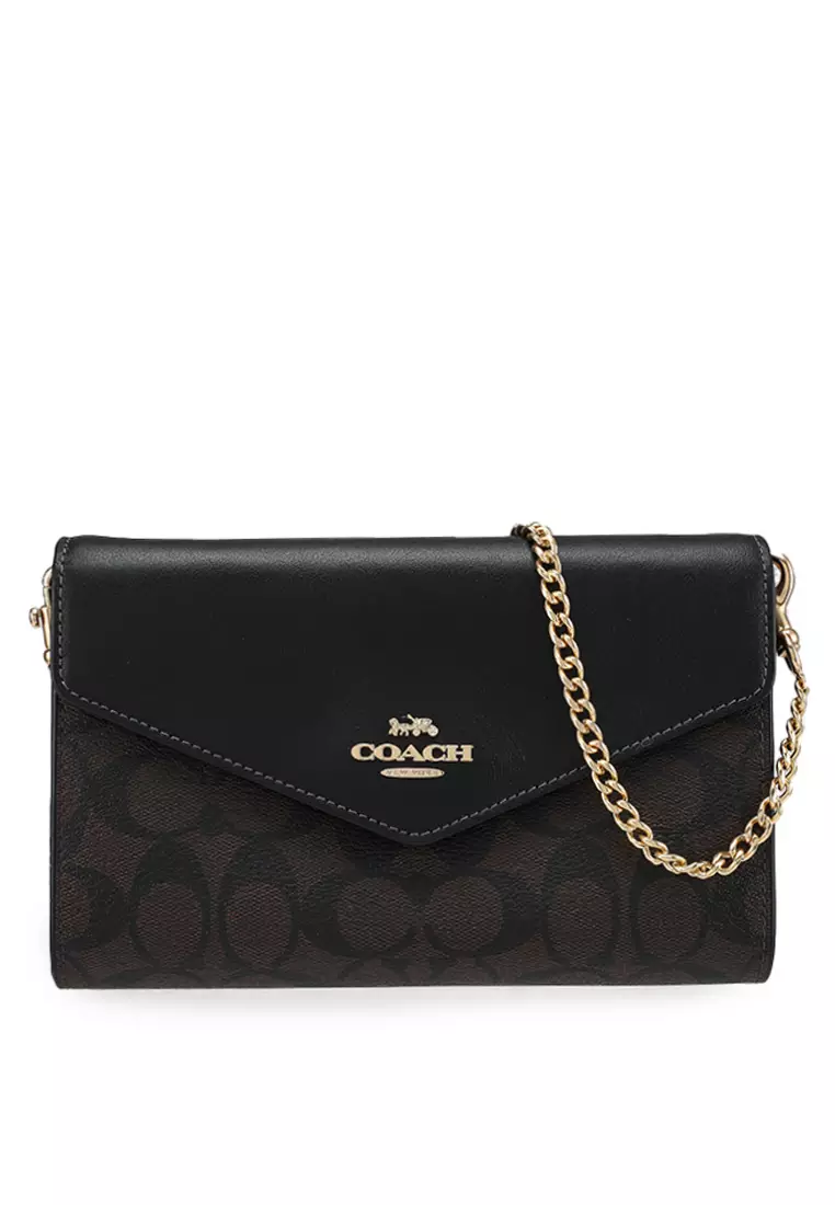 Coach envelope clutch clearance