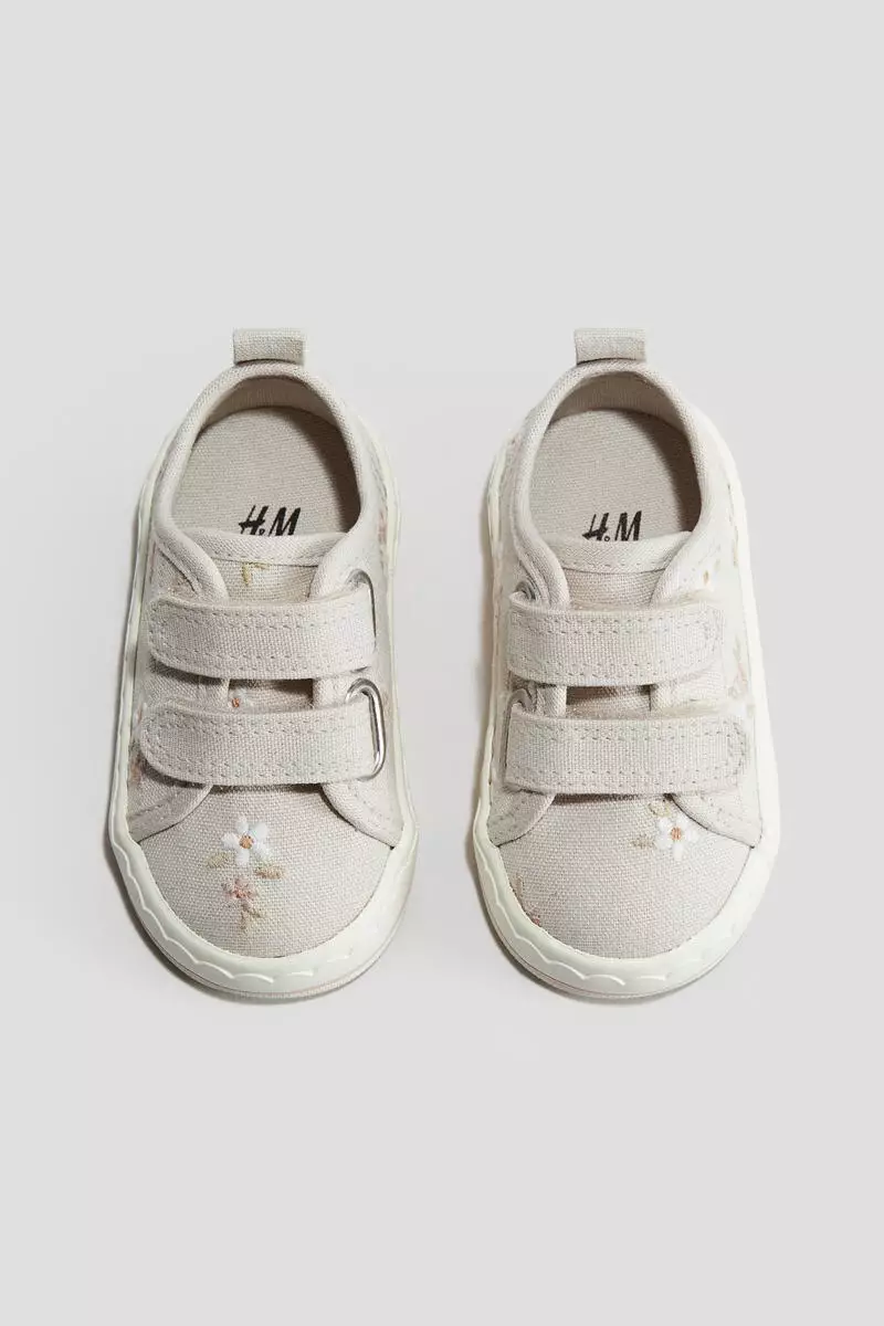 Embroidery-detail canvas trainers