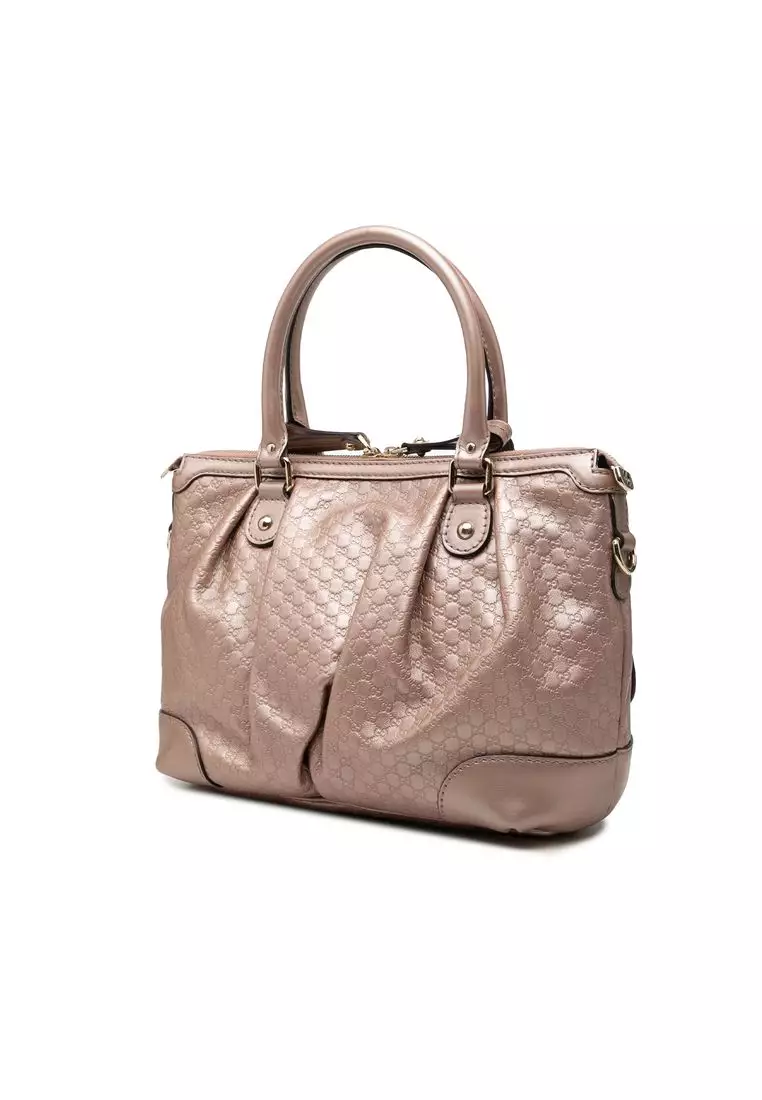 Pre-Loved Gucci Metallic Microguccissima Sukey Satchel