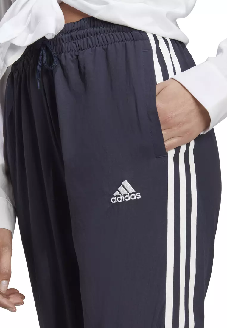 Buy ADIDAS Essentials 3-Stripes Woven 7/8 Tracksuit Bottoms 2024 Online