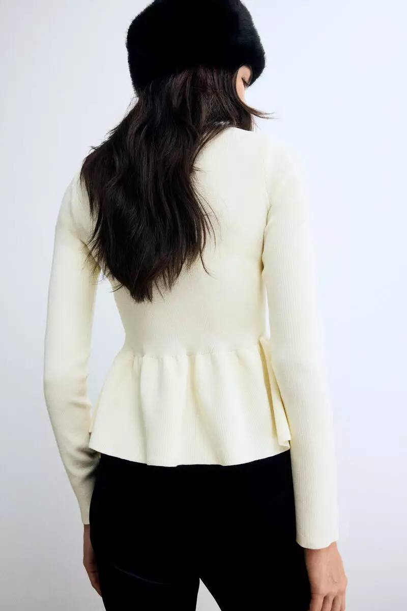 Knitted peplum top