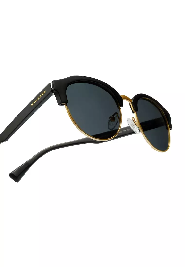 HAWKERS POLARIZED Gold Dark CLASSIC ROUNDED Sunglasses for Men and Women, Unisex. UV400 Protection. Official Product designed in Spain