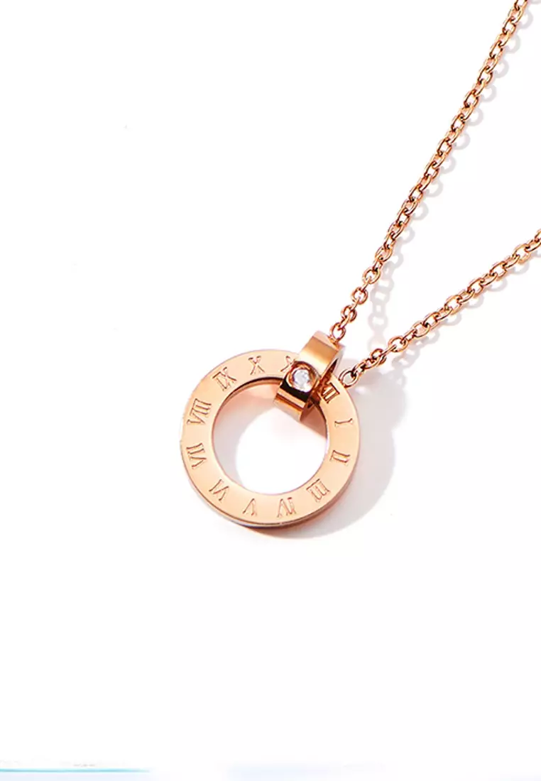CELOVIS - Artemis Interlocking Roman Numeral Ring Pendant Necklace in Rose Gold