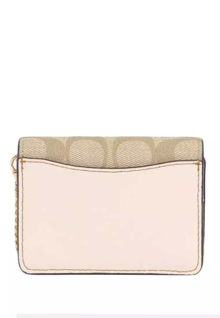 Buy COACH Coach Mini Wallet On A Chain In Signature Canvas With