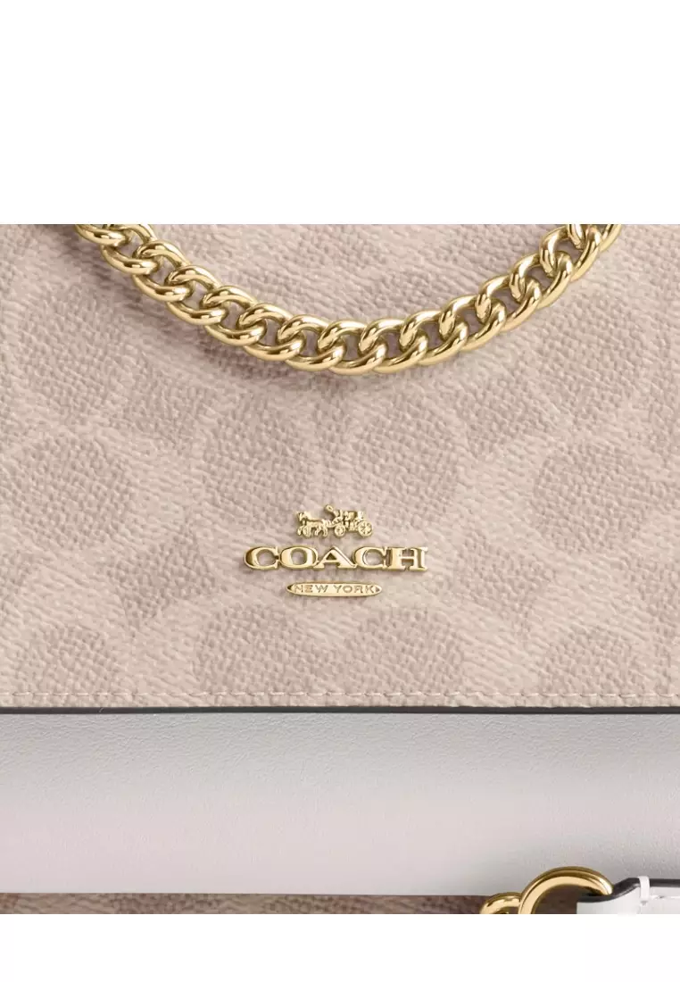 Mini Klare Crossbody Bag in Signature Canvas Gold Sand Chalk