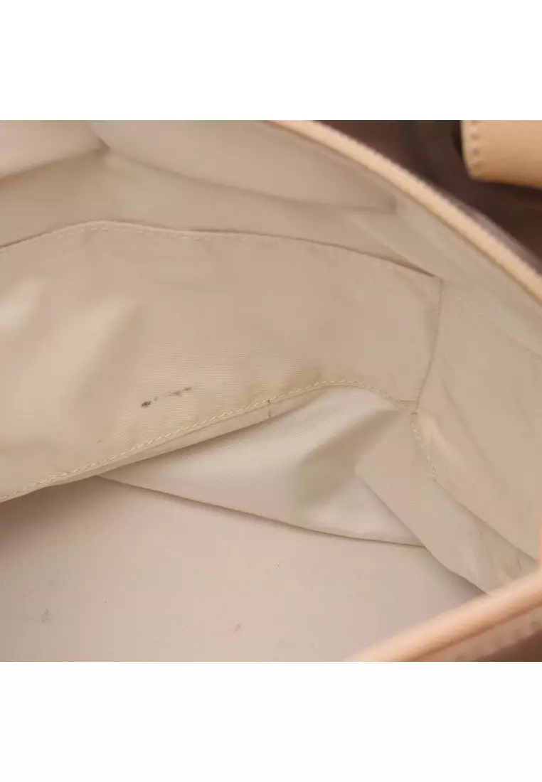 Pre-Loved Chanel Paris Biarritz PM Handbag tote bag Coated canvas leather Champagne Gold beige silver hardware