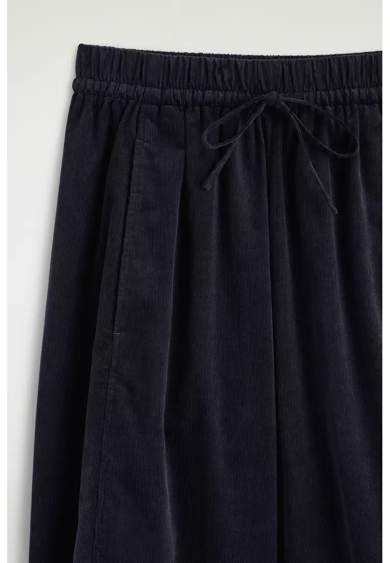 ELASTICATED CORDUROY BARREL-LEG TROUSERS