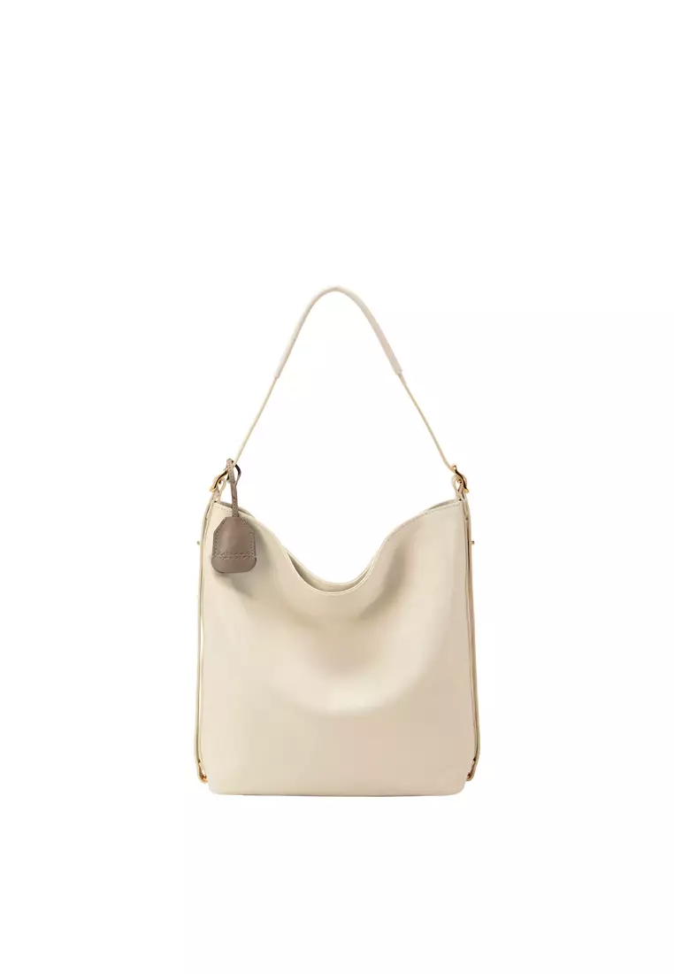 Cream colour best sale bag