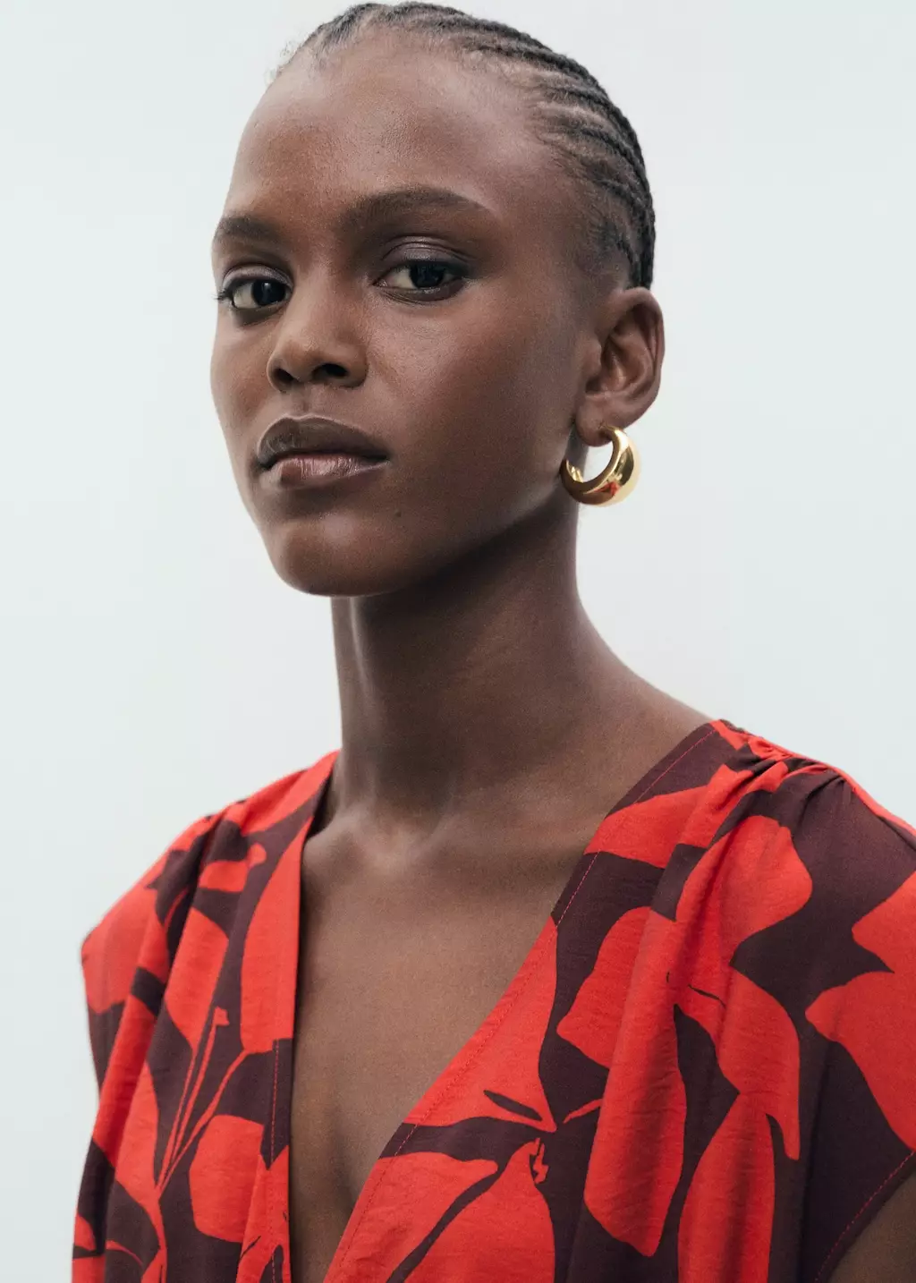 Gaun panjang bermotif