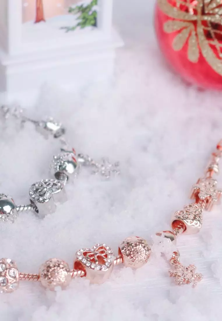 Rose gold pandora bracelet with silver charms on sale